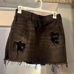 Black denim skirt
